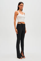 Black pinstripe high-waist pants with straight legs and front slit
