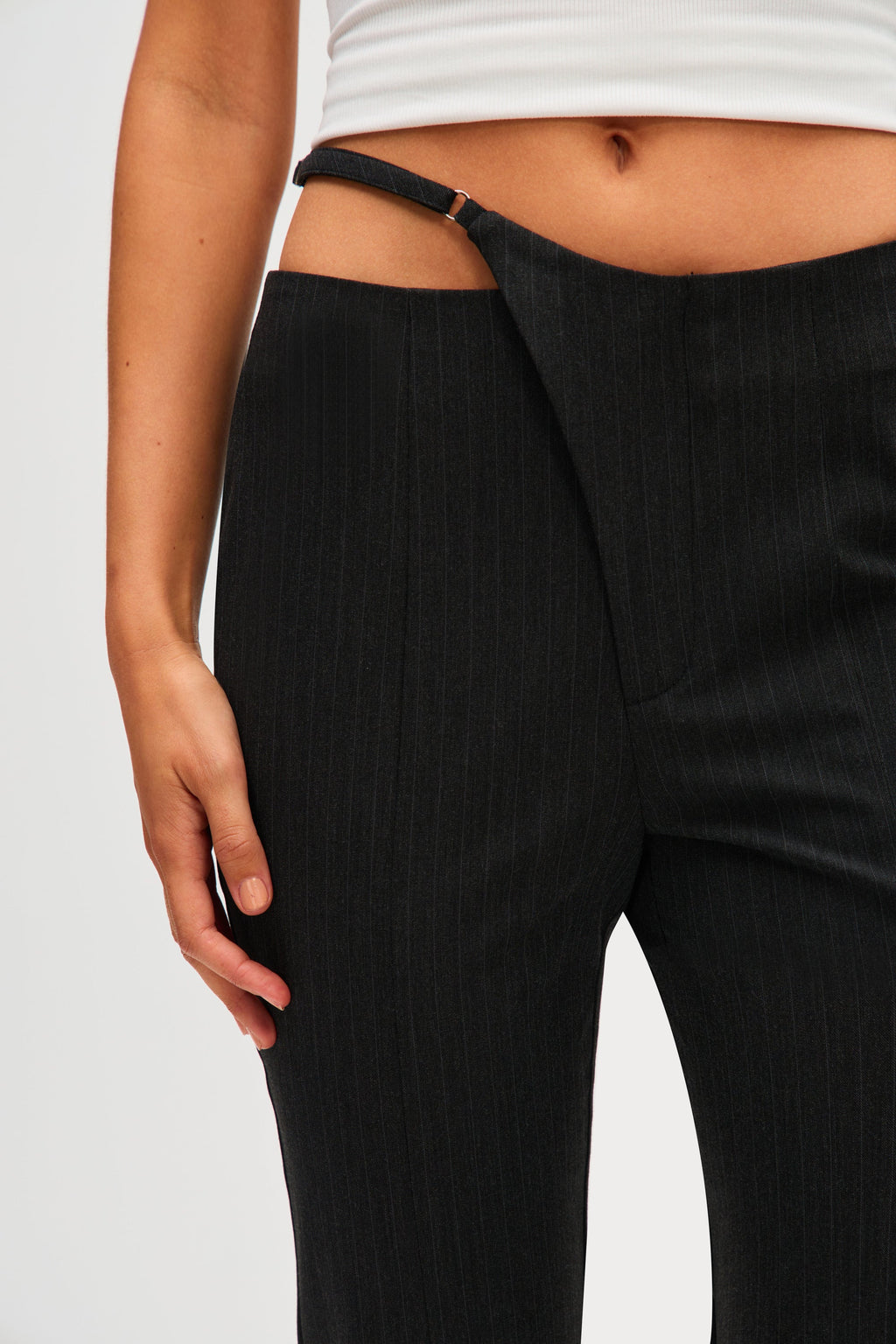 Black pinstripe pants detail with high waist and stitched center seam