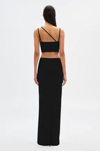 Black maxi dress back view with thin shoulder straps and structured bodice