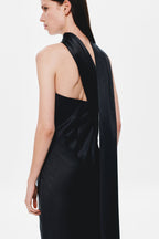 Black satin halter-back dress with open back and draped strap detail
