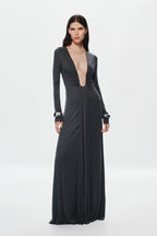 Dark long-sleeve maxi dress with deep V front, gathered waist, and flowing skirt.