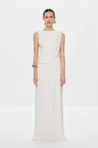 Ivory sleeveless maxi dress with draped bodice and pleated skirt