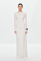 Ivory long-sleeve maxi dress with ruched bodice and draped side detail