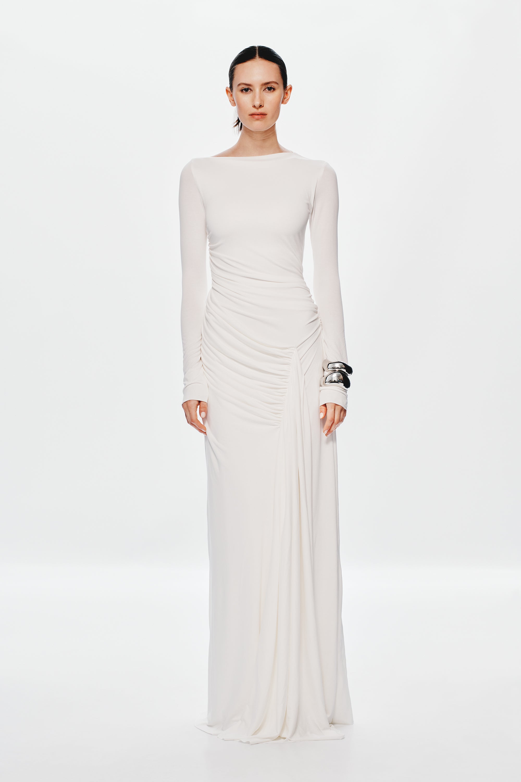Ivory long-sleeve maxi dress with ruched bodice and draped side detail