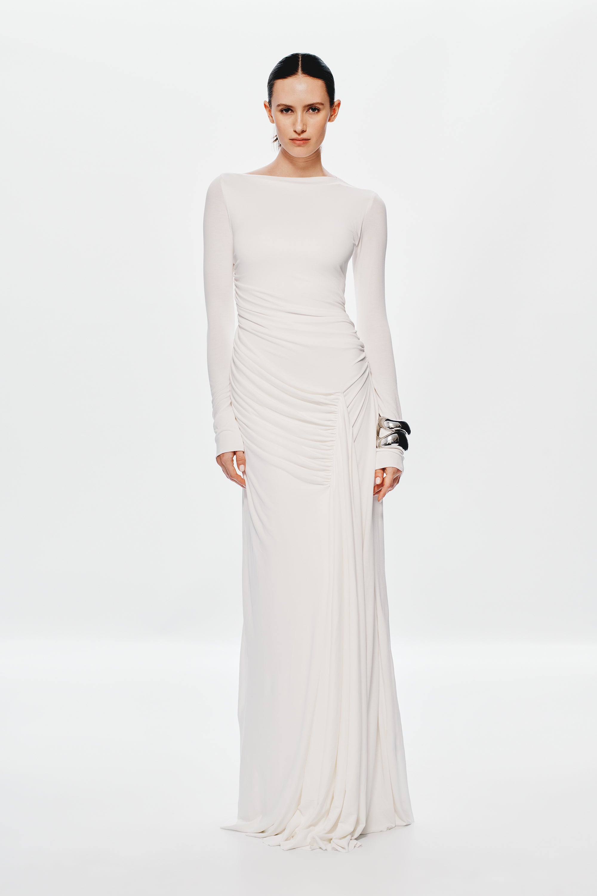 Ivory fitted long-sleeve maxi dress with gathered waist and draped front
