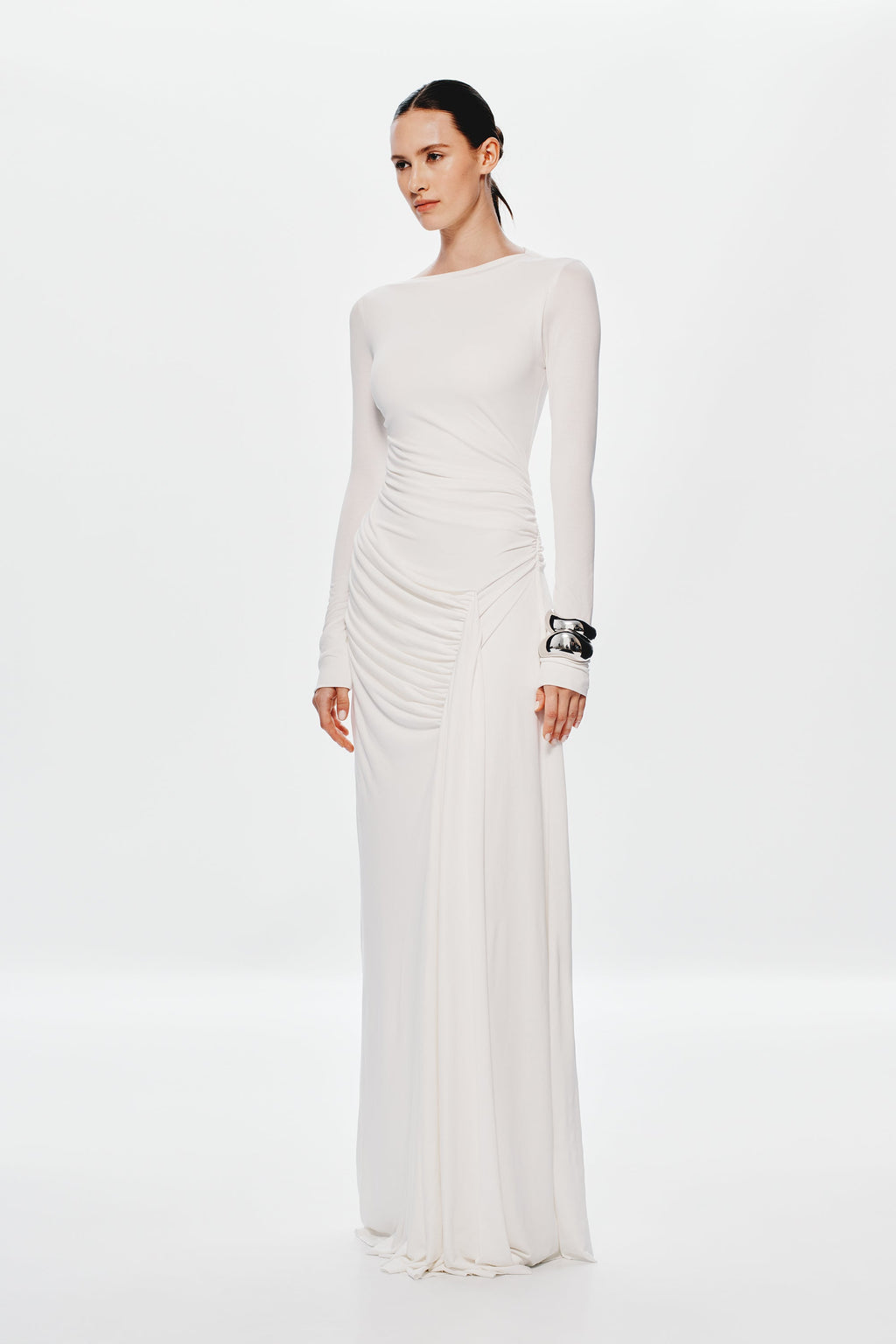 Ivory long-sleeve maxi dress with ruched waist and draped side detail