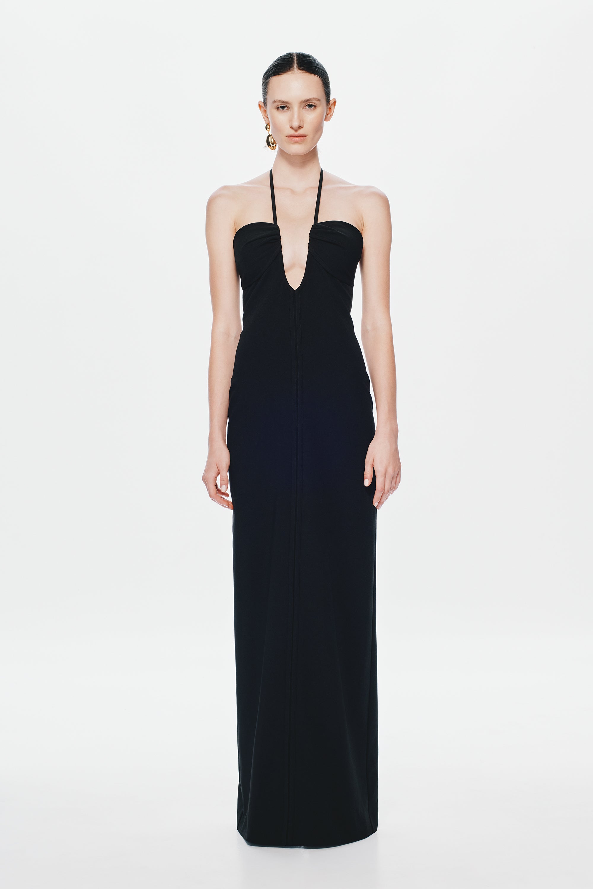 Black halter maxi dress with keyhole neckline and fitted column shape