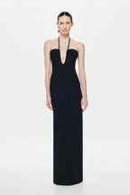 Black halter maxi dress with sweetheart bust, fitted bodice, and long column skirt