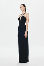 Black halter maxi dress with draped bodice and side profile, long column skirt