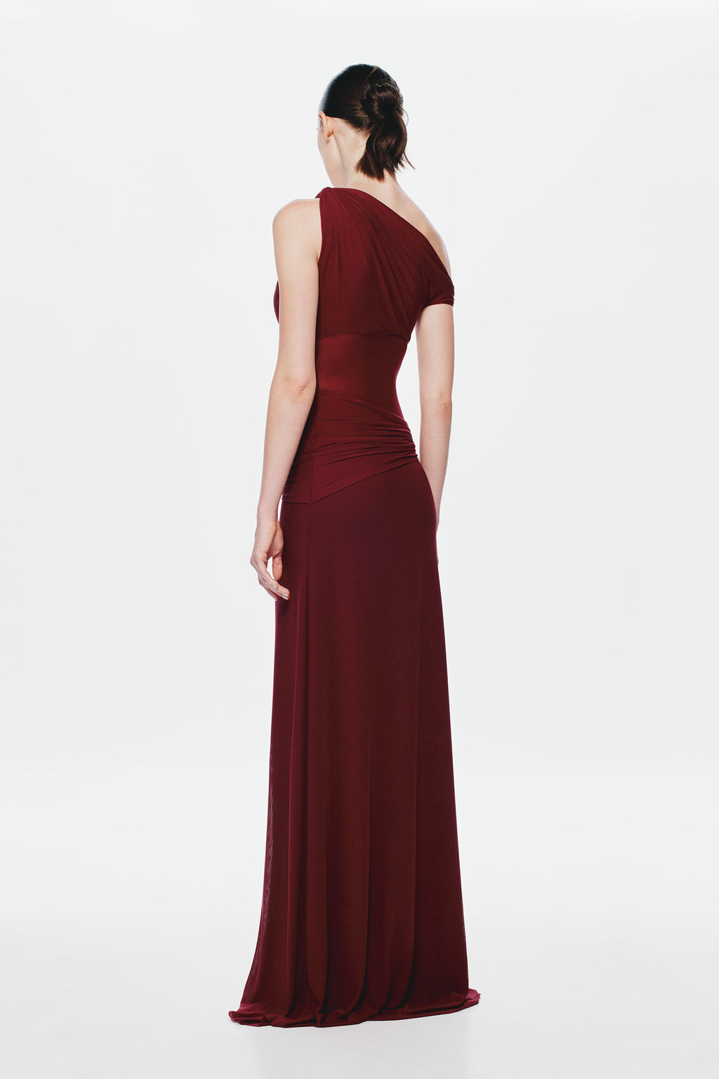 Maroon one-shoulder maxi dress with draped back and fitted waist