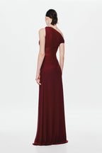 Maroon one-shoulder maxi dress with draped back and fitted waist