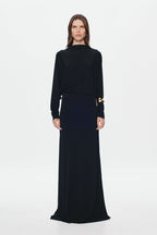 Black jersey maxi dress with long sleeves, high neck, waist belt