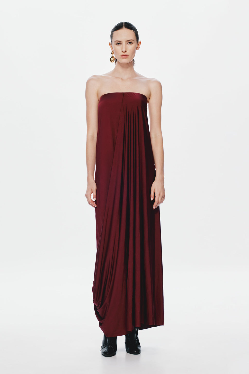 Burgundy strapless maxi jersey dress with soft pleats and draped skirt