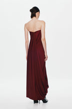 Burgundy strapless maxi jersey dress with ruched back seam and flowing drape