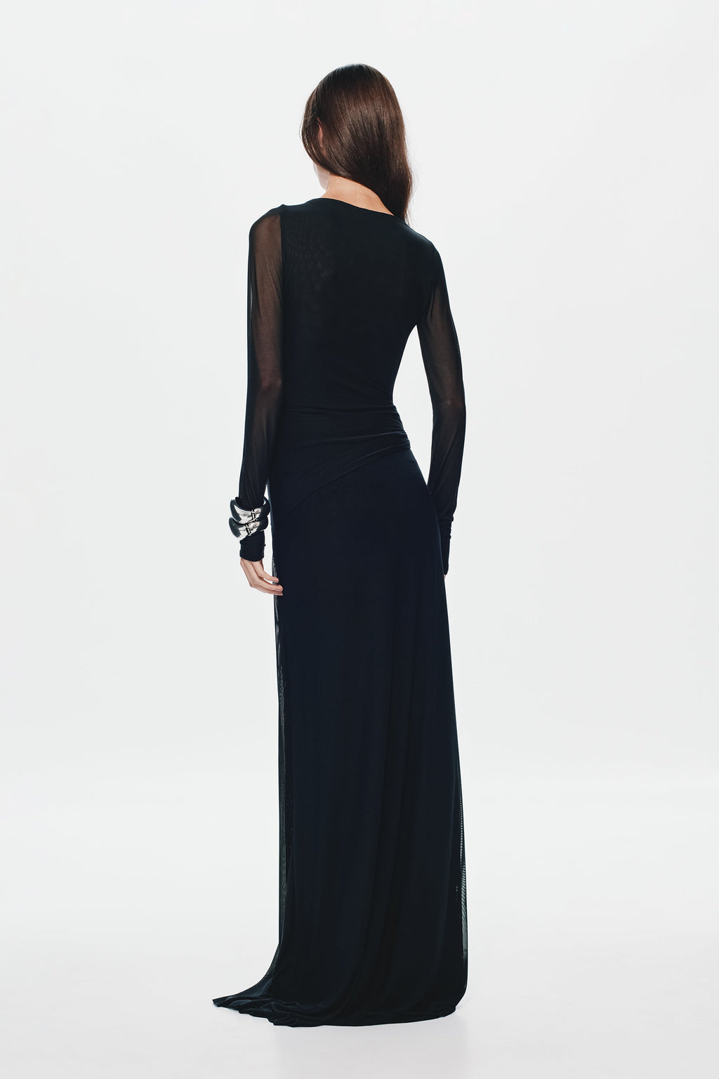 Black mesh maxi dress with sheer back, long sleeves, and fitted maxi length