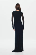 Black mesh maxi dress with sheer back drape, long sleeves, and fitted waist