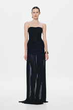 Black strapless maxi dress with ruched bodice and draped long skirt
