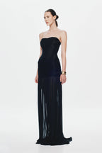 Black strapless maxi dress with ruched bodice and flowing tiered skirt