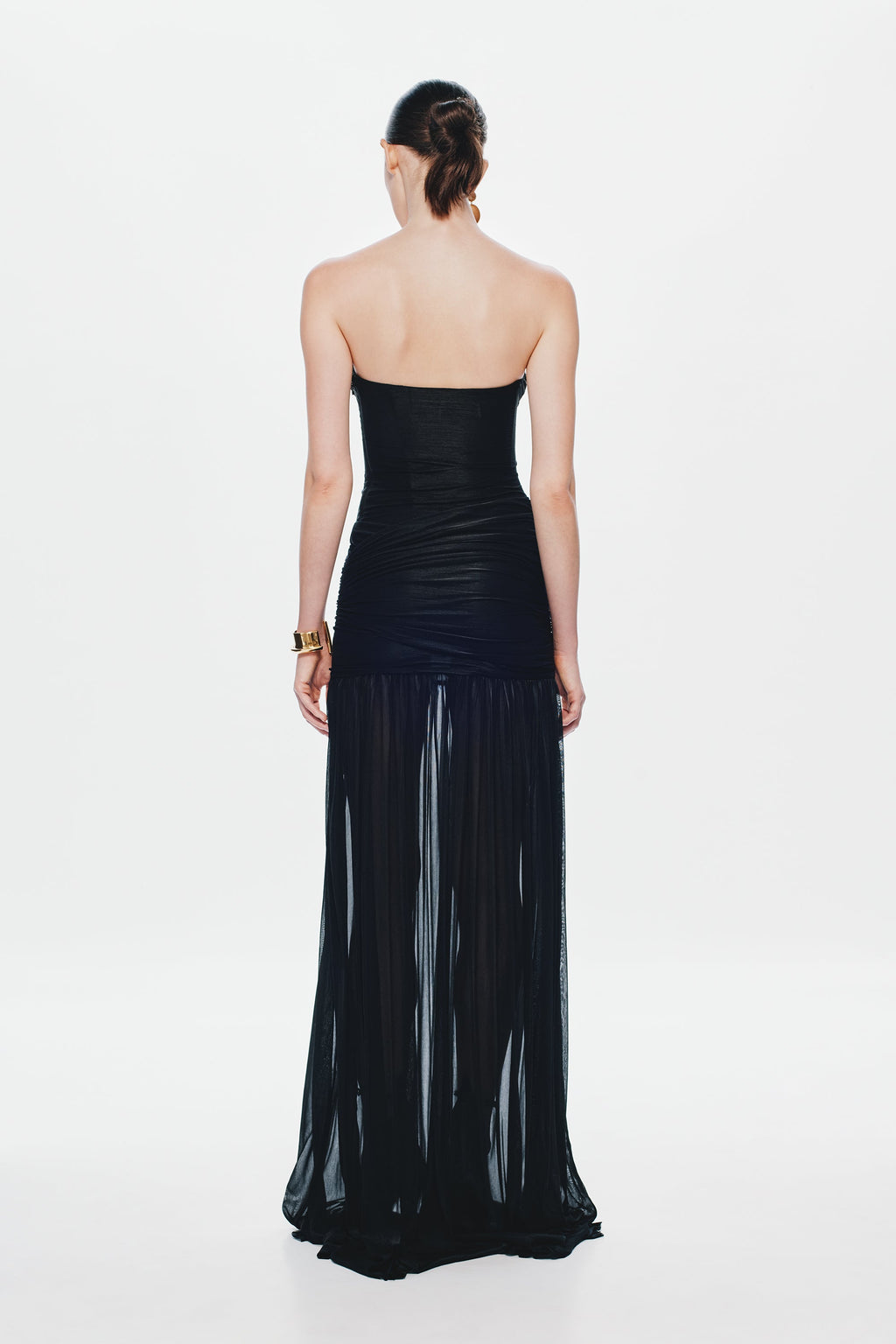 Black strapless maxi dress with ruched back and tiered pleated skirt