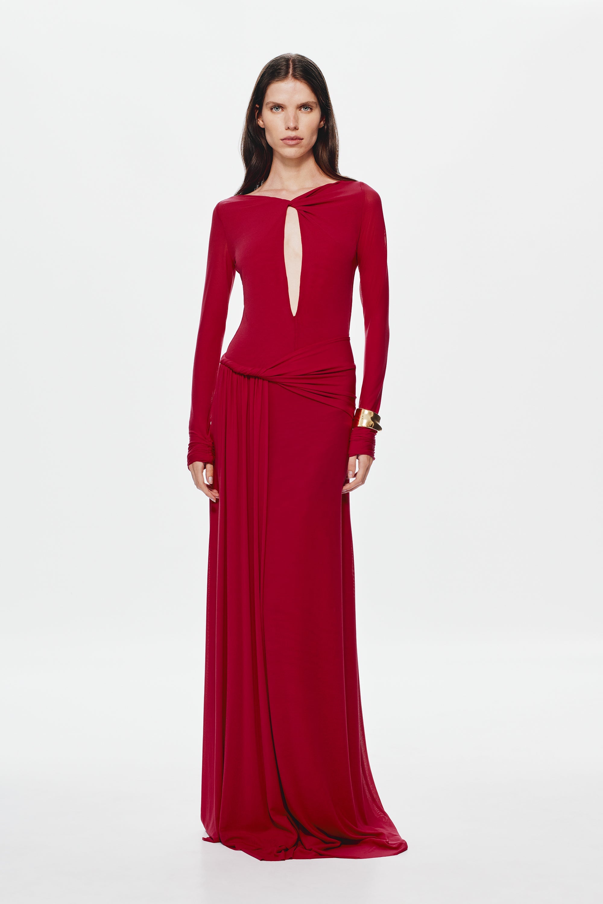 Cherry red mesh dress with long sleeves, keyhole cutout, and draped waist skirt