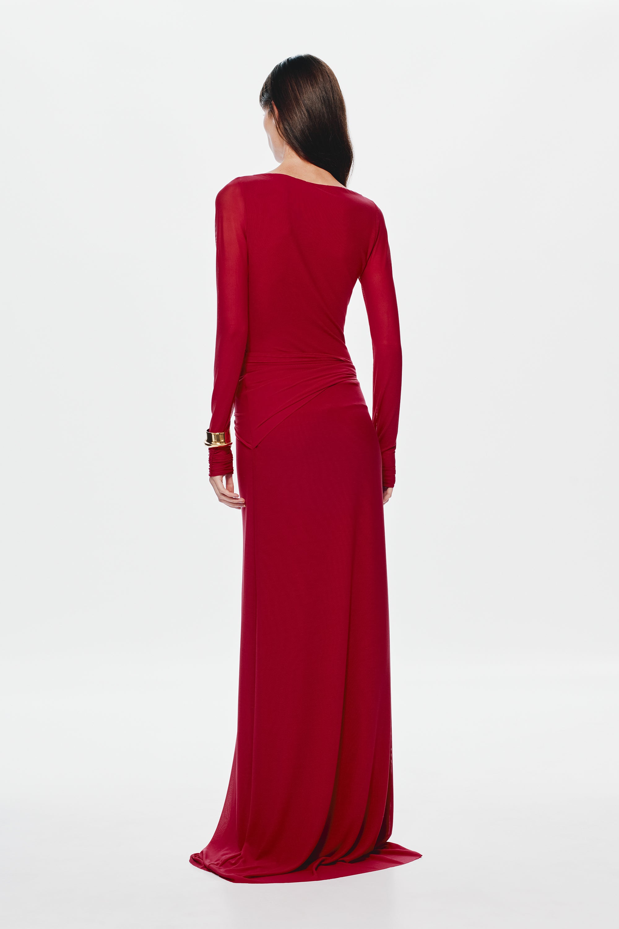Back view of cherry red mesh dress with long sleeves and center keyhole opening