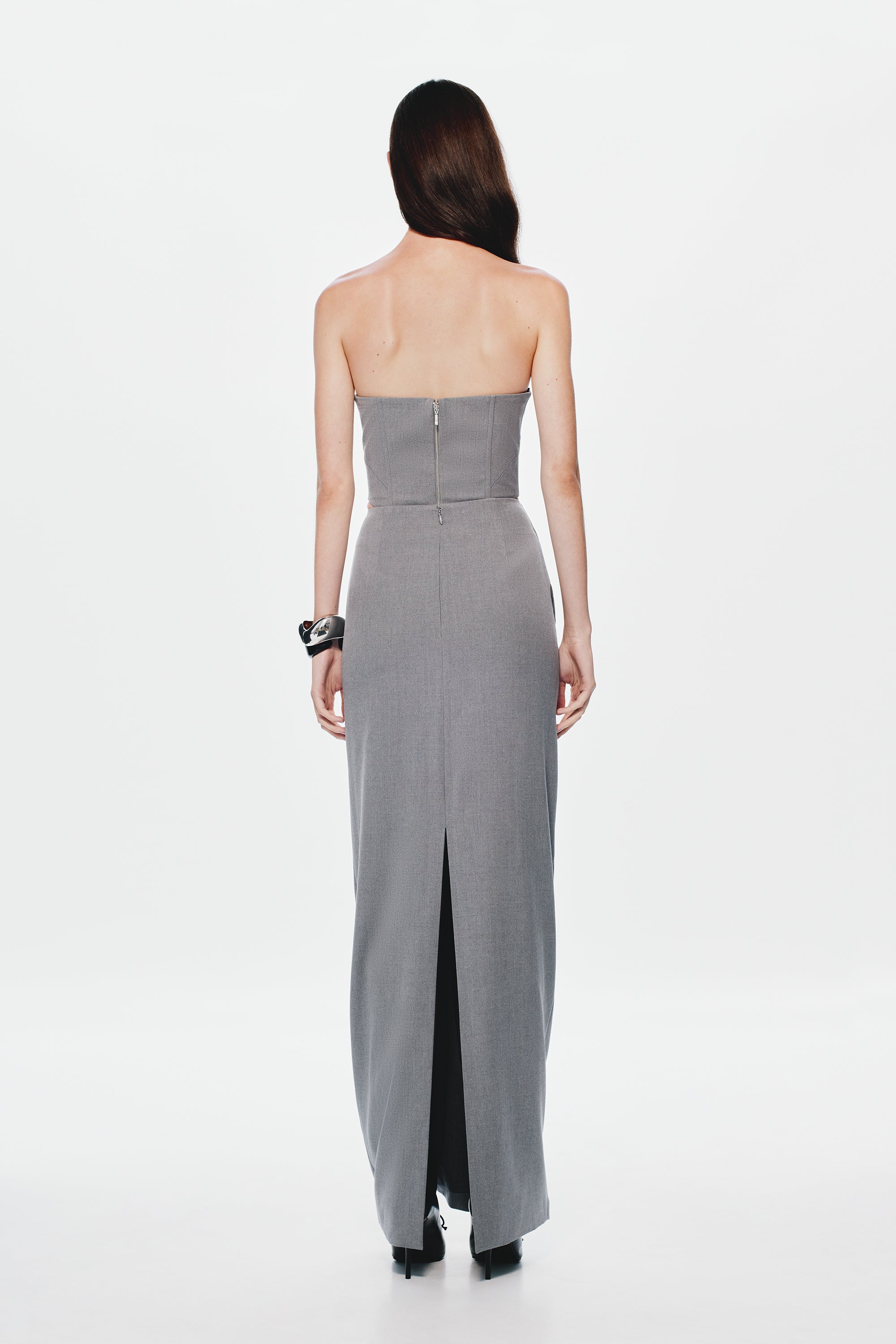 Grey longline strapless bustier, back view with vertical seam and slit