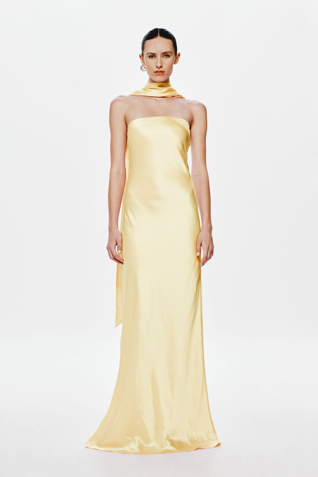 Soft yellow satin halter dress with strapless neckline, long column silhouette