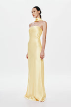 Soft yellow satin halter dress with draped side panel, long column hem