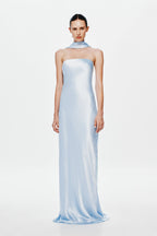 Light blue satin column dress with strapless straight neckline and side slit.