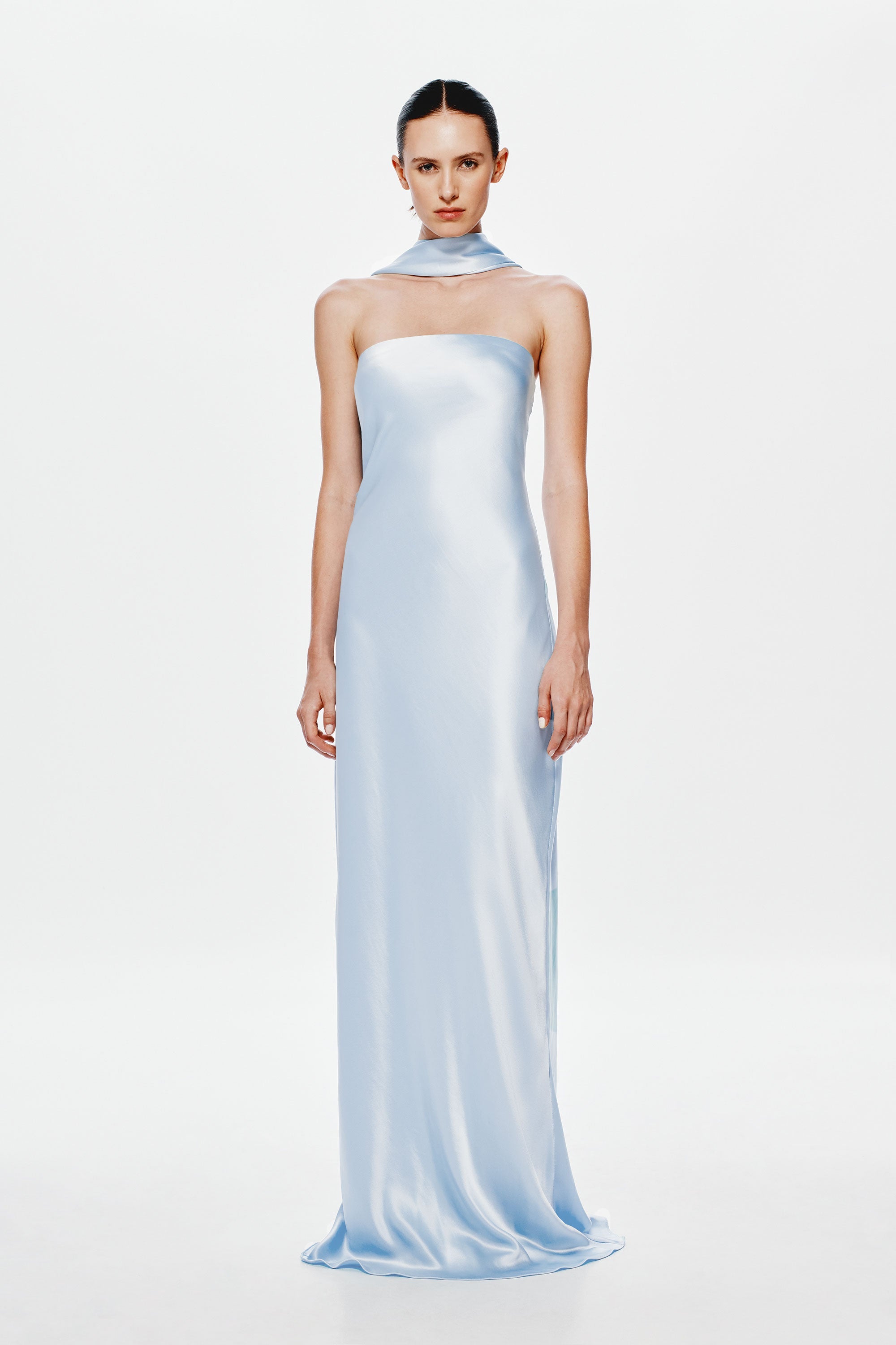 Light blue satin column dress with strapless straight neckline and side slit.
