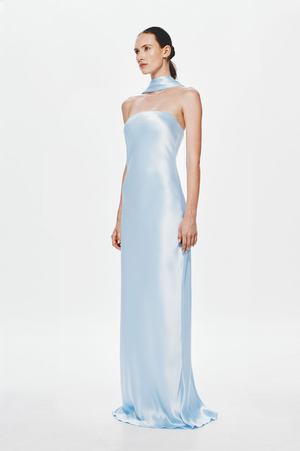 Light blue satin strapless maxi dress with open-back drape detail.