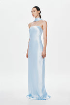 Light blue satin strapless maxi dress with open-back drape detail.