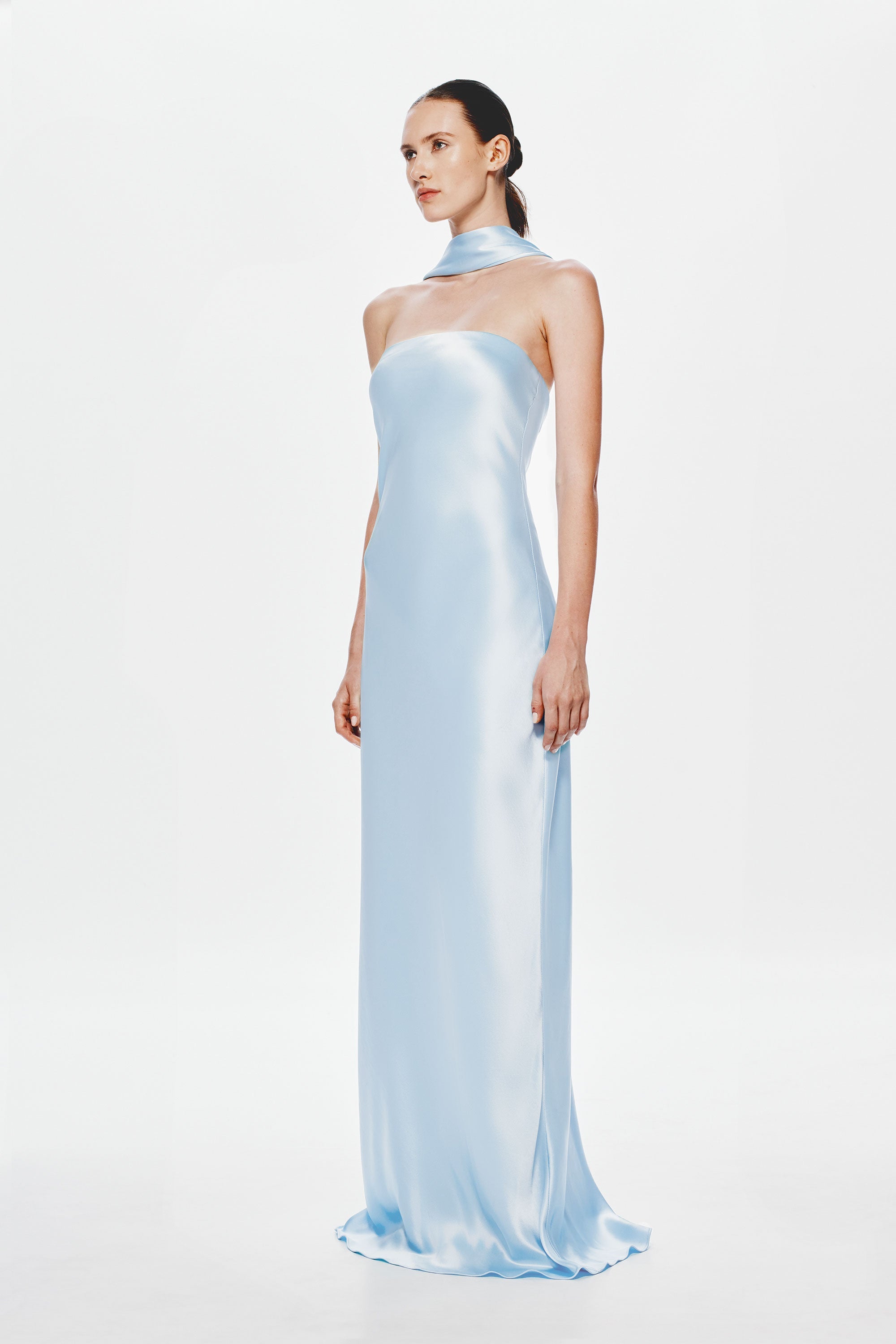 Light blue satin strapless maxi dress with open-back drape detail.