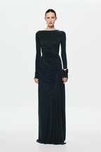 Black long-sleeve maxi dress with ruched waist, diagonal drape, and gathered skirt