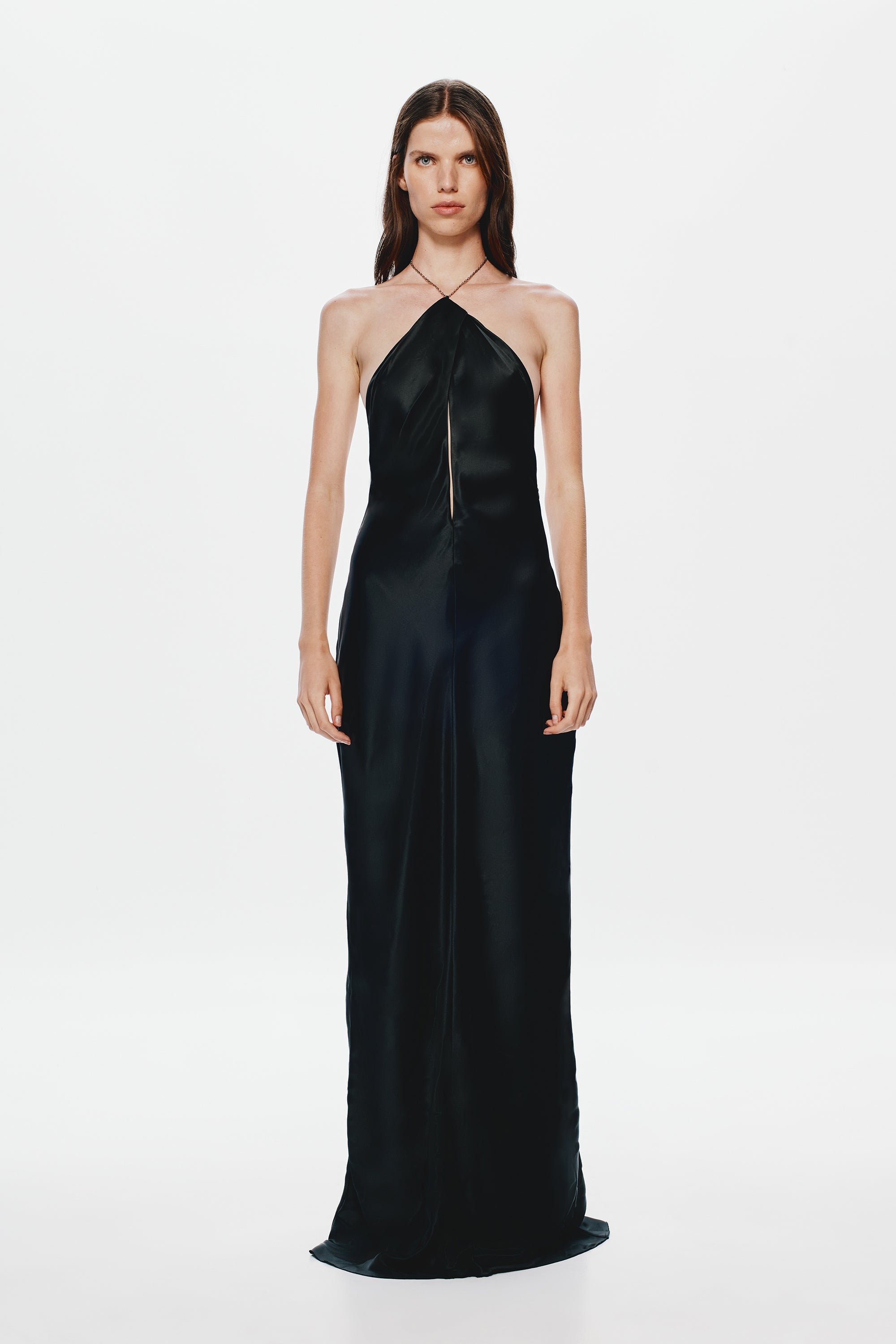 Black satin halter evening dress with high halter neck and floor-length column skirt.