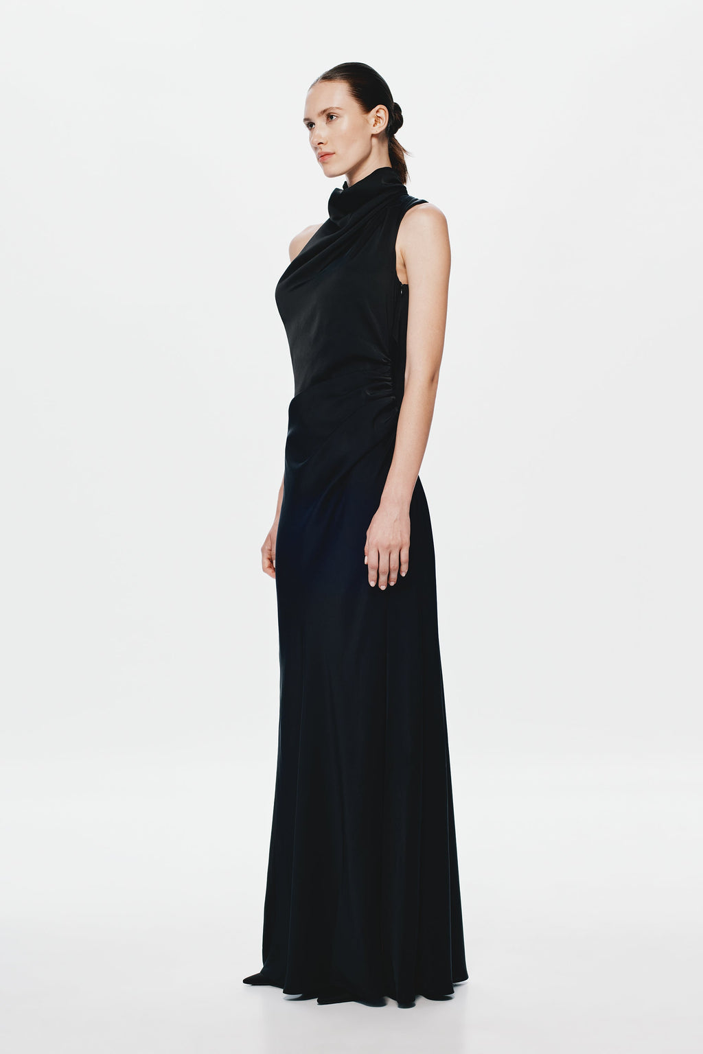 Black satin sleeveless maxi dress with high neck drape and side ruching detail