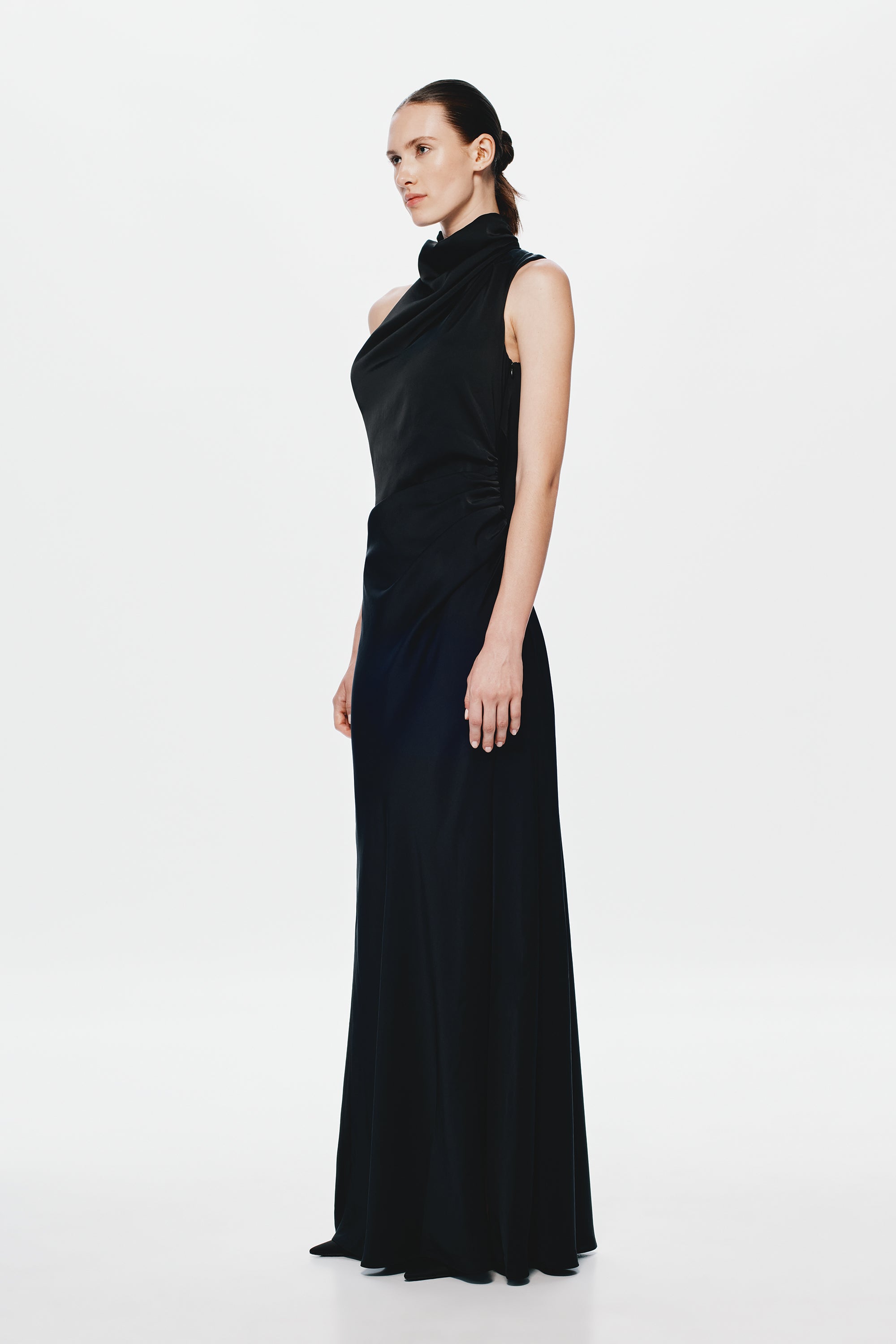 Black satin sleeveless maxi dress with high neck drape and side ruching detail