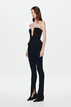 Black strapless corset top with keyhole neckline and peplum waist, side view