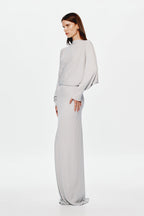 Grey jersey maxi dress with high neck, long sleeves, and draped waist
