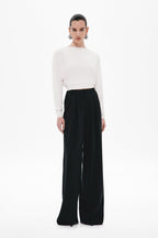 Black high-waisted wide-leg suiting pants with relaxed fit