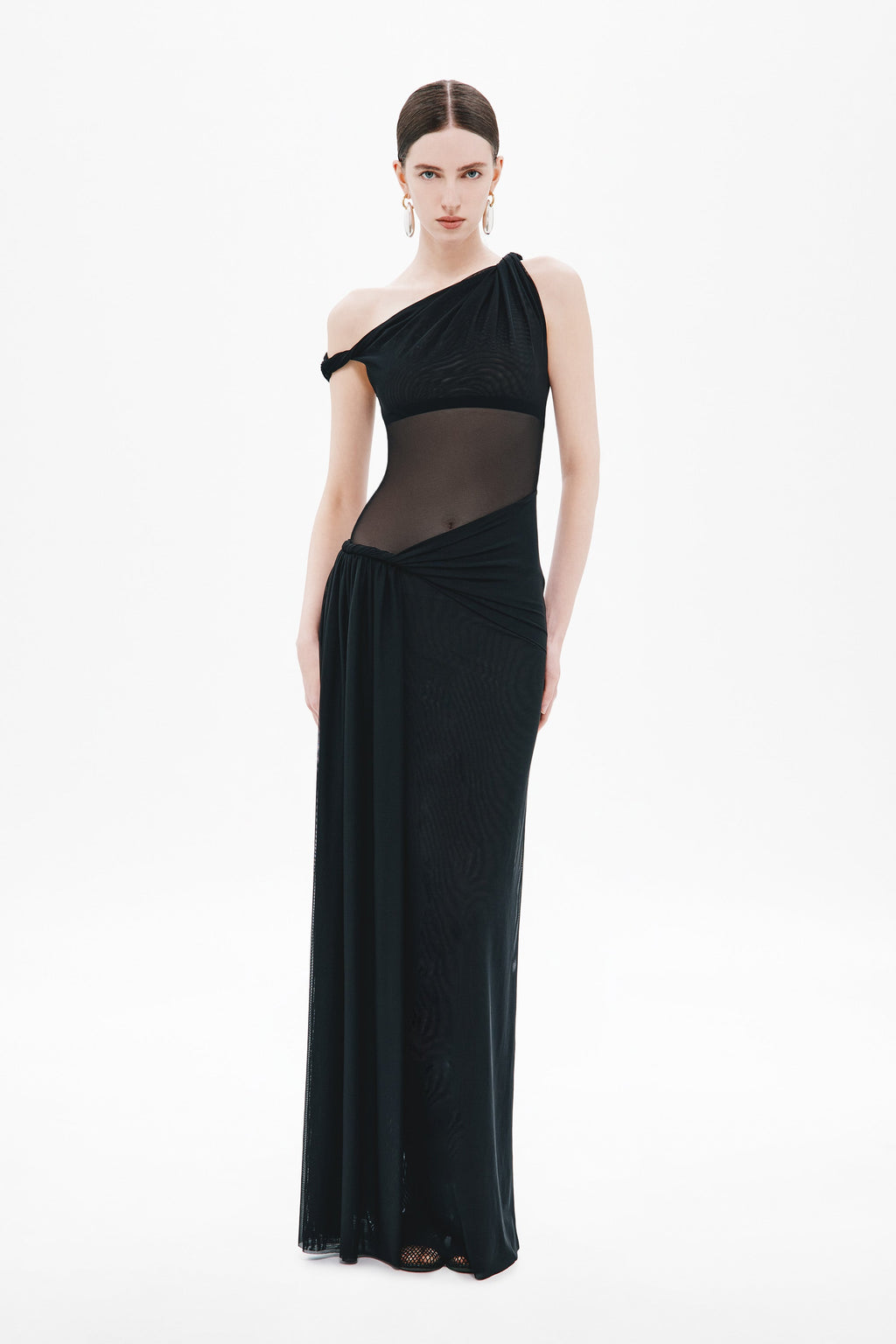 Black one-shoulder mesh maxi dress with diagonal drape and sheer midsection