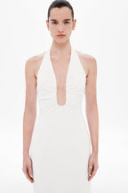 Ivory halter dress with ruched neckline and sleeveless fitted bodice.