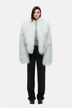 Pale mint shearling jacket with open front, long sleeves, fluffy textured finish
