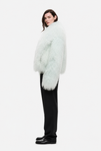 Pale mint shearling jacket with fluffy texture and open front, side view