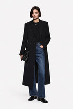 Black long notch-collar coat with double-breasted buttons and tailored seams