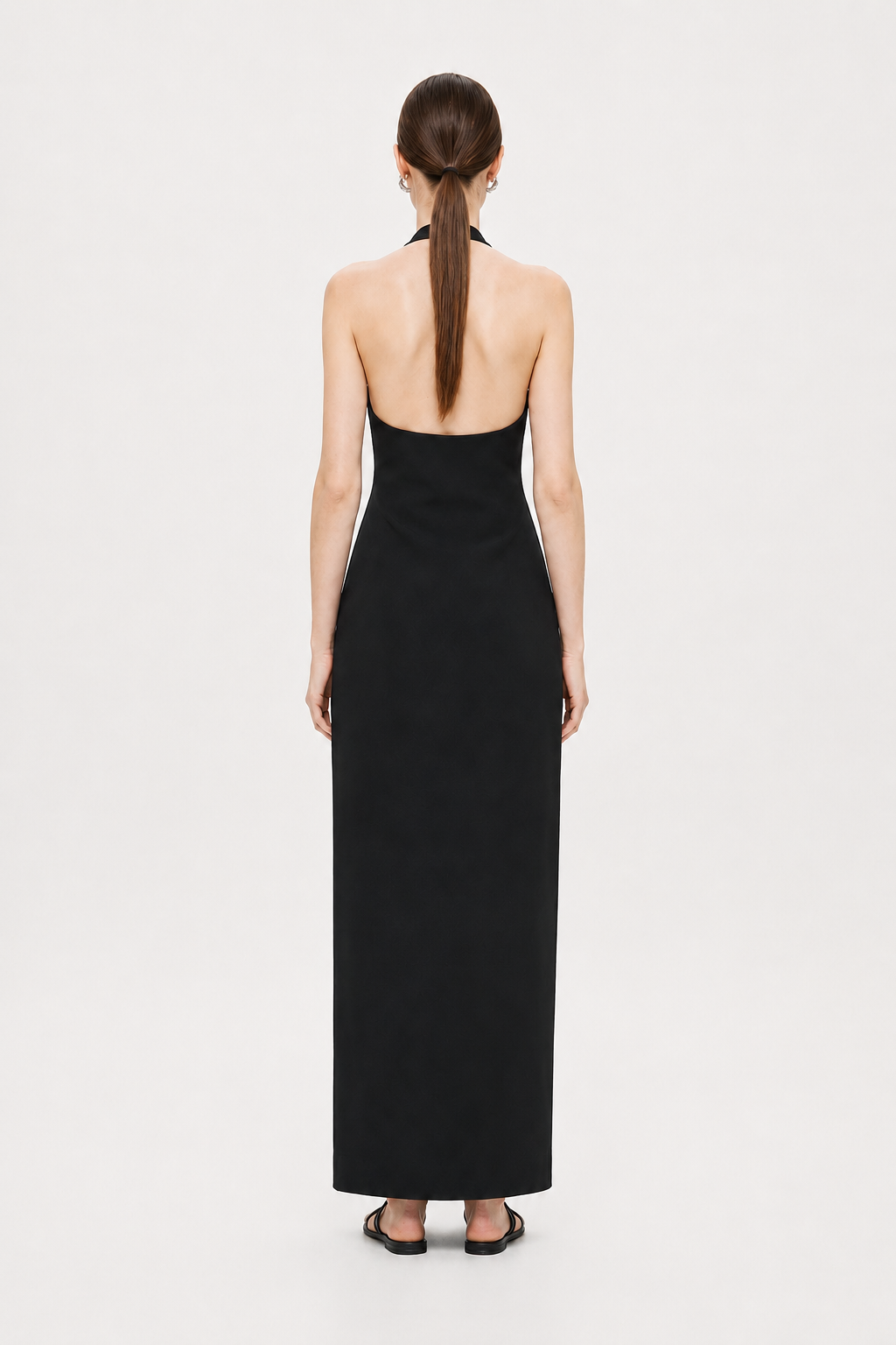 Black sleeveless halter maxi dress, open-back design with halter straps