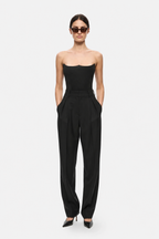 Black strapless jersey bodysuit with straight neckline and fitted waist seam