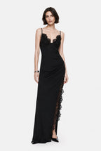 Black jersey dress with lace trim, spaghetti straps and V-shaped neckline