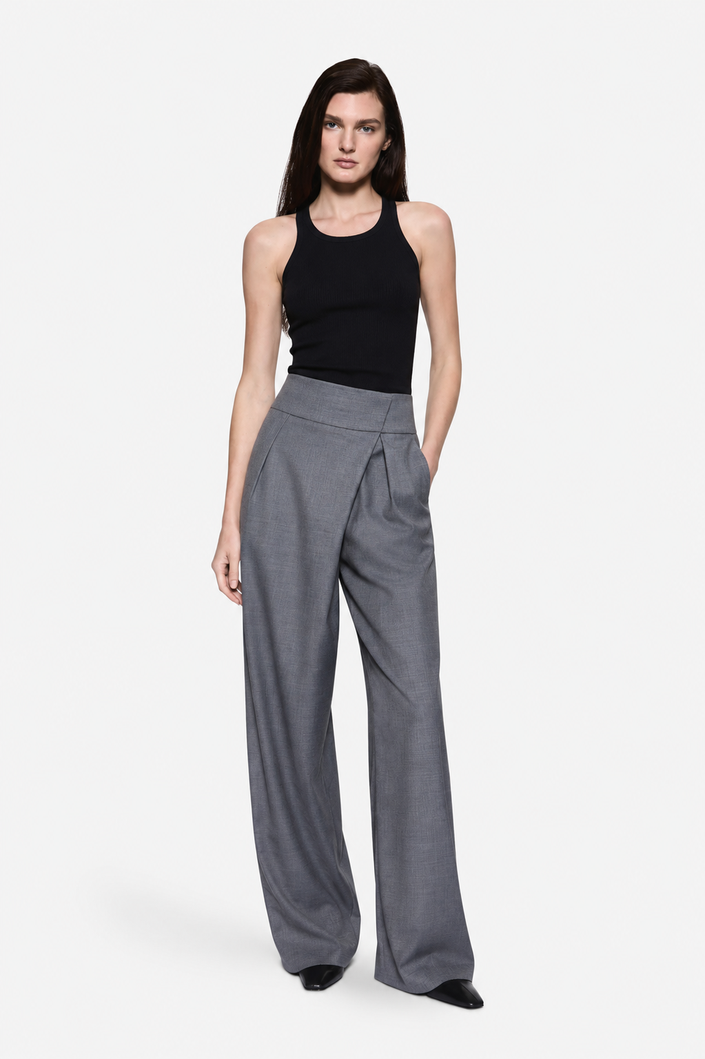 Grey wrap-front suiting pants with wide-leg silhouette