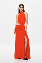 Chili red sleeveless halter jersey dress with draped waist ruching and high side slit